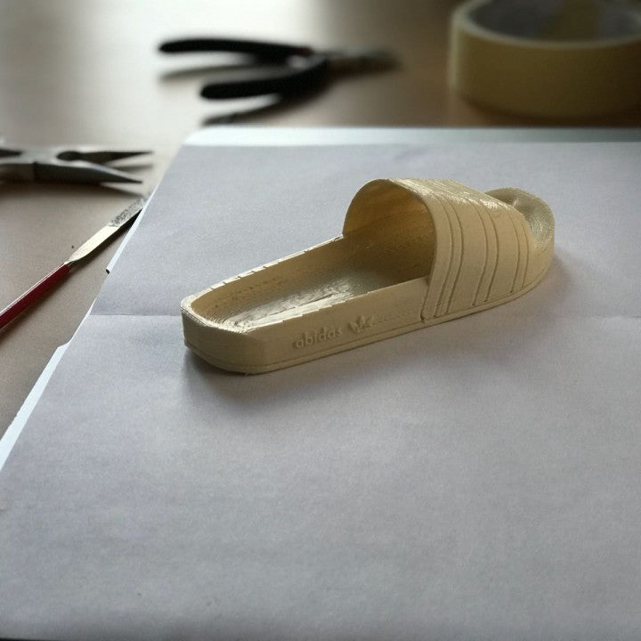 Adidas slippers by Marco Feng