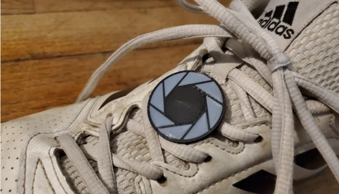 Aperture Science Shoelace Badge by UnitedPixel