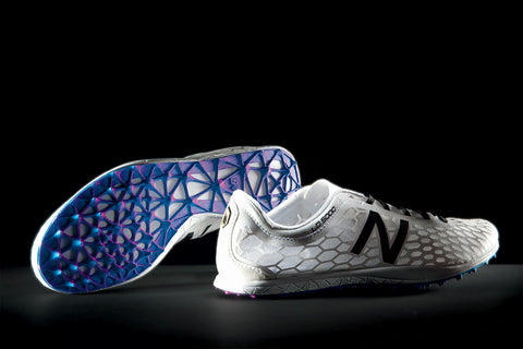 A pair of intricately designed 3D-printed shoes showcasing the potential of additive manufacturing in the footwear industry.