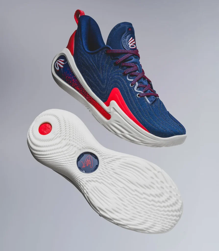 Steph Curry in one of his two Under Armour Curry 12 sneakers releasing this week in Olympic colorways.