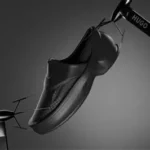 HUGO x Zellerfeld 3D‑printed loafer suspended against a dark gradient background