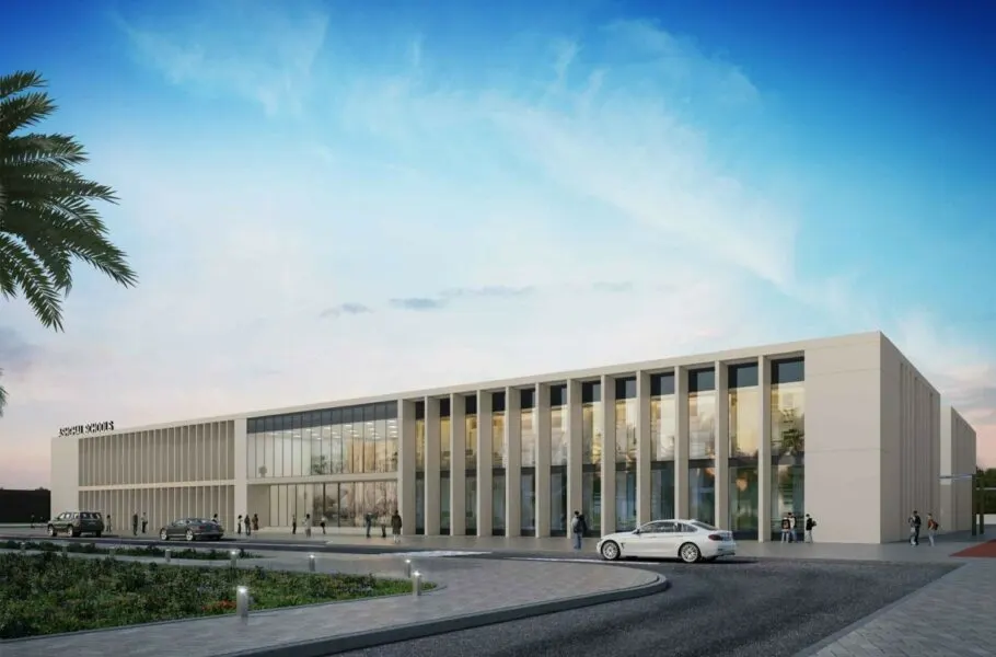 Architectural rendering of a minimalist 3D‑printed school block under a blue desert sky