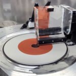 The new 3D printer allows two different materials to be simultaneously fused by a laser on the rotating platform. (Image credit: Michael Tucker / ETH Zurich)