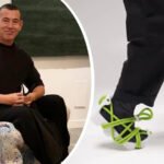 Daniyar Uderbekov seated beside a fabric chair, with close-up of UDRB sneakers showing white 3D-printed soles and bright green rope laces.
