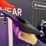 Alexander Wang’s 3D-printed Griphoria kitten heel displayed at Formnext 2025, featuring a black micro-textured upper and lattice footbed.