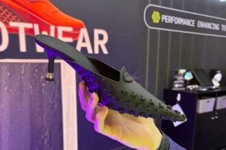 Alexander Wang’s 3D-printed Griphoria kitten heel displayed at Formnext 2025, featuring a black micro-textured upper and lattice footbed.