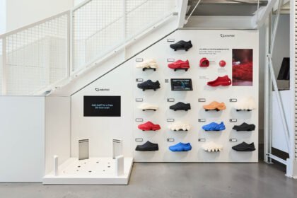 Zellerfeld retail display with 3D printed shoes and a foot scanning station for custom footwear.