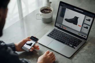 Customer using a smartphone foot scan before buying custom 3D printed shoes with limited returns
